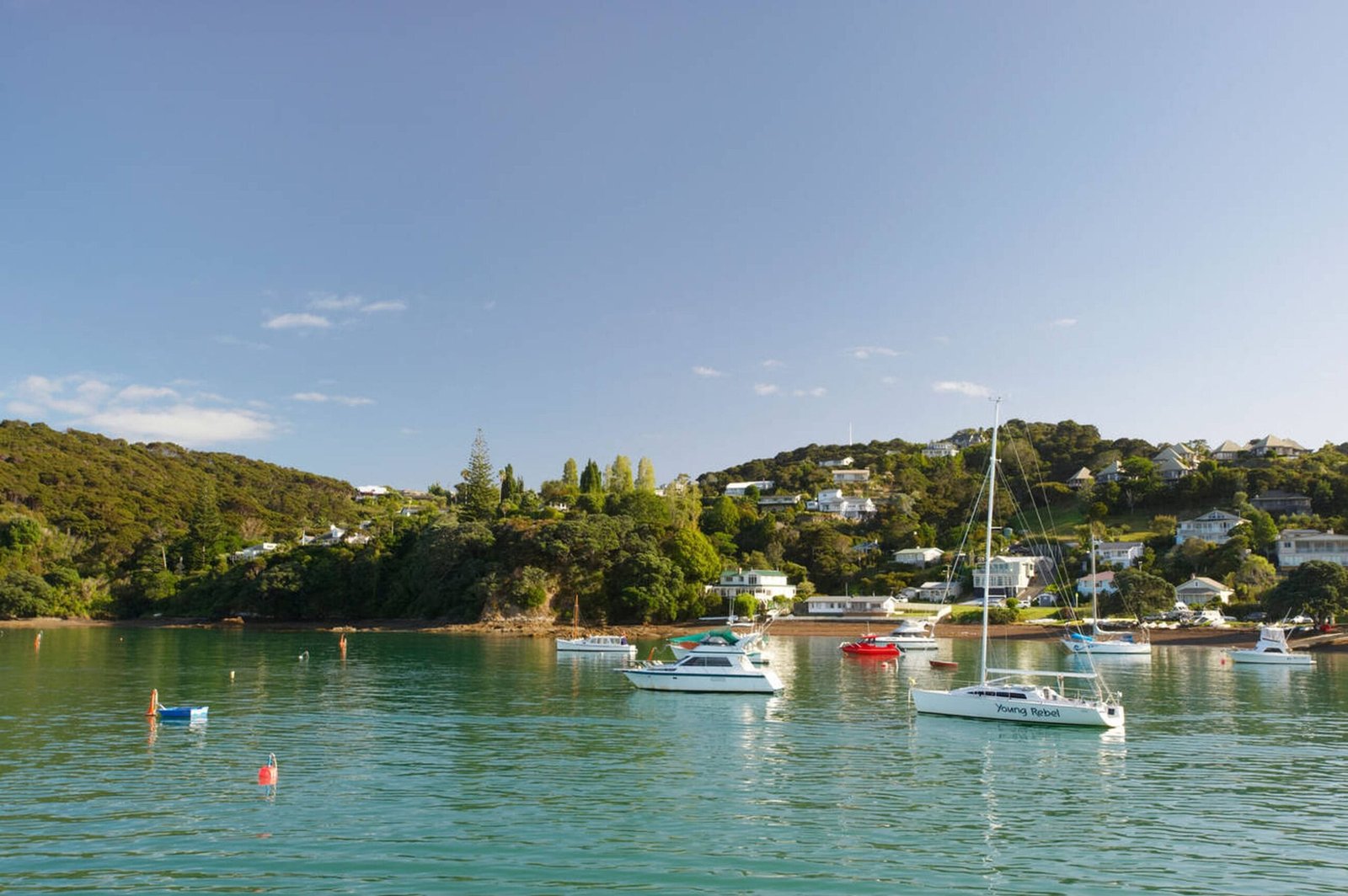 Sailing boats in the turquoise waters of Bay of Islands, New Zealand
